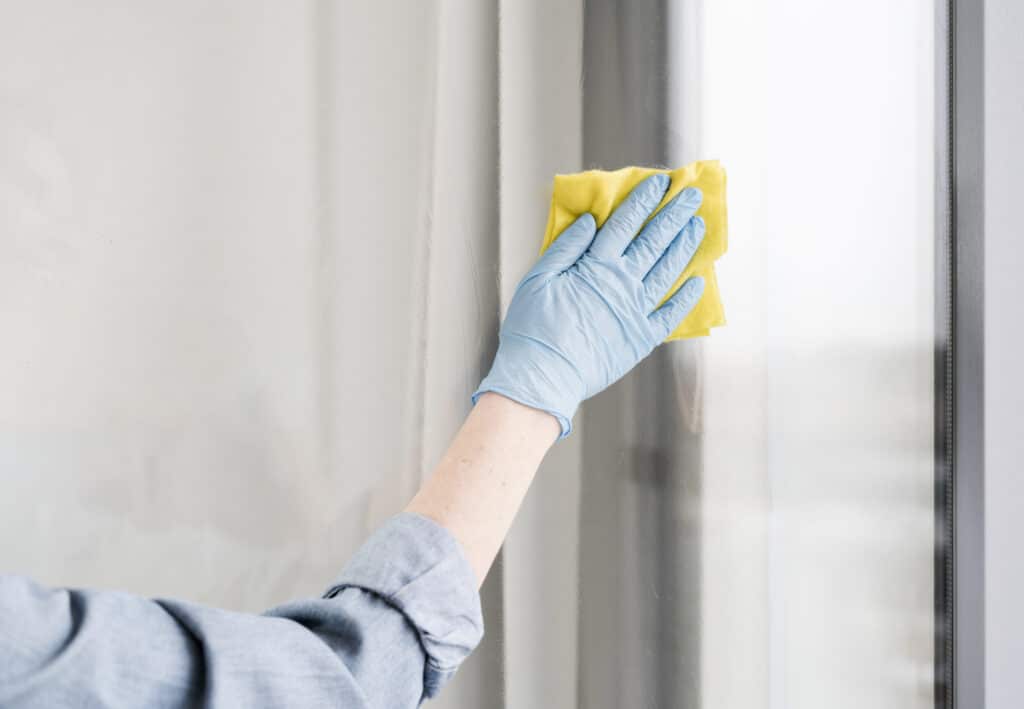 About vecteezy woman with rubber glove wiping window high quality beautiful photo concept 2996071 Turn Klean
